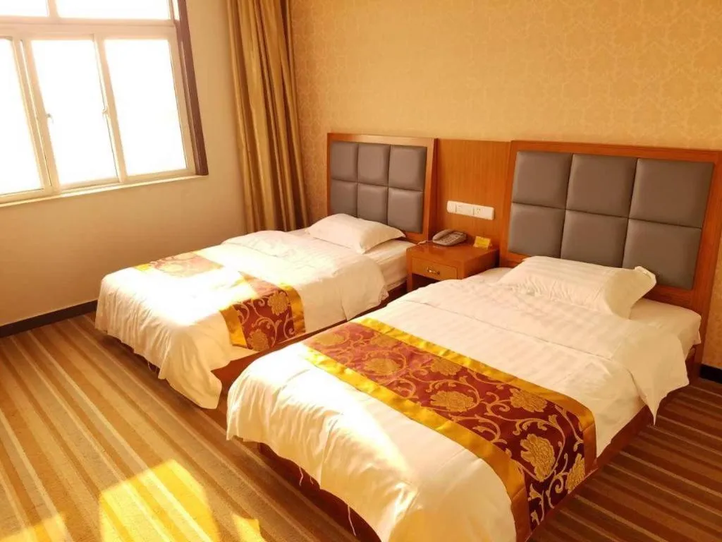 Bed in 169 Business Hotel