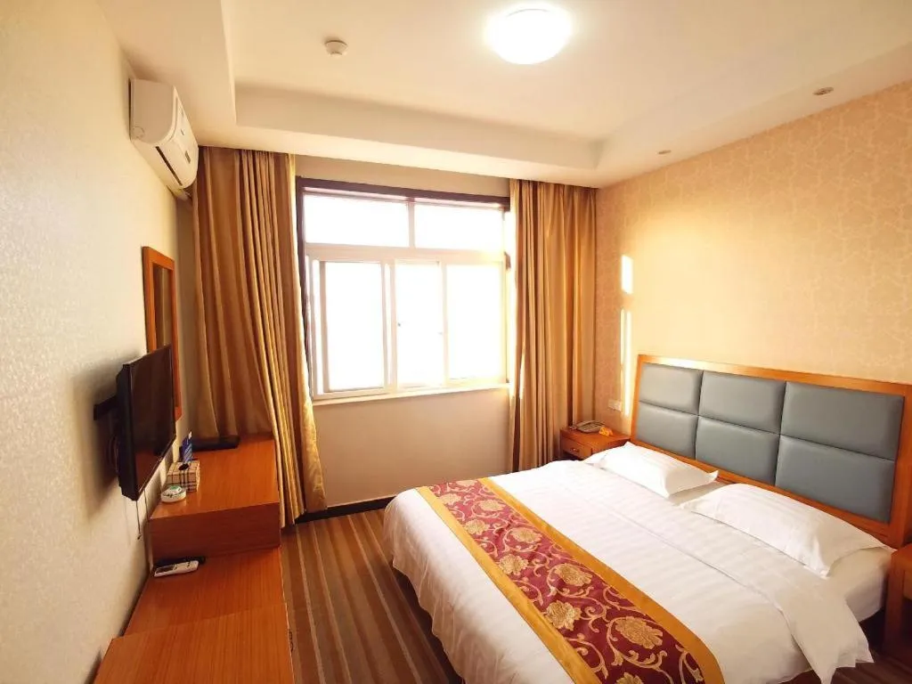 Bed in 169 Business Hotel