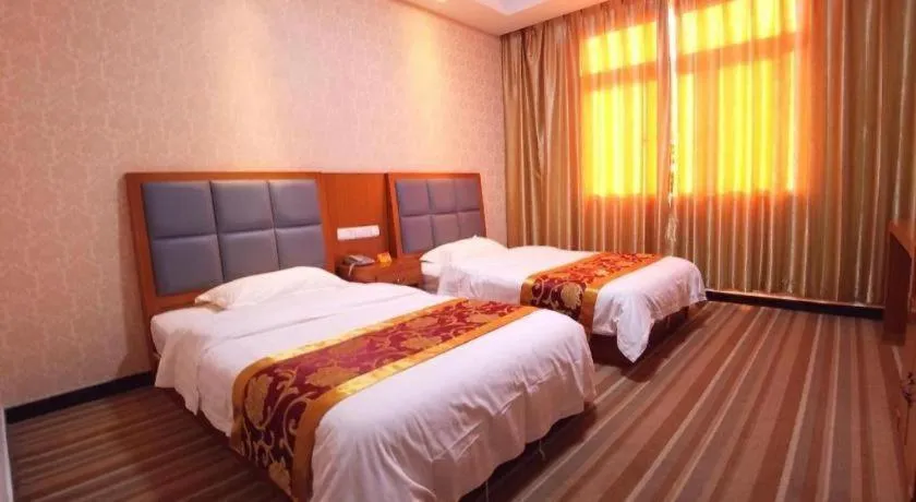 Bed in 169 Business Hotel