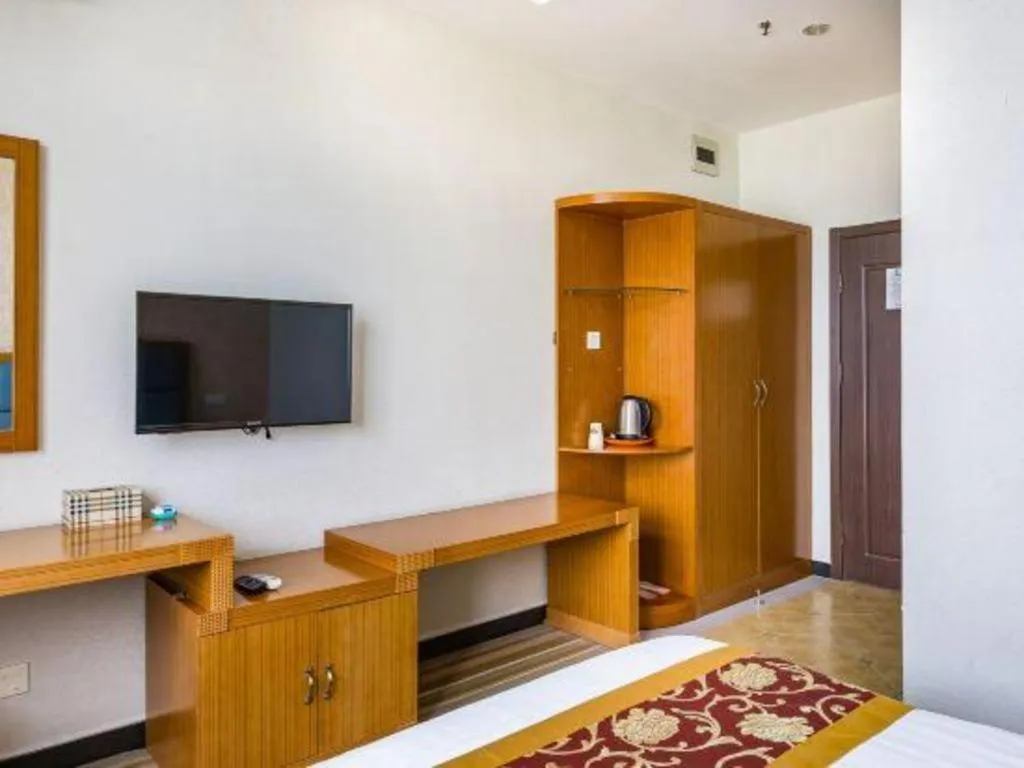 Bed in 169 Business Hotel