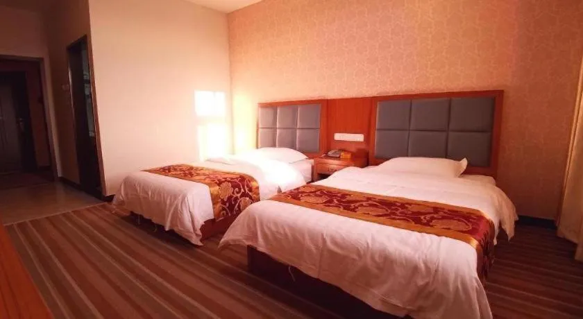 Bed in 169 Business Hotel