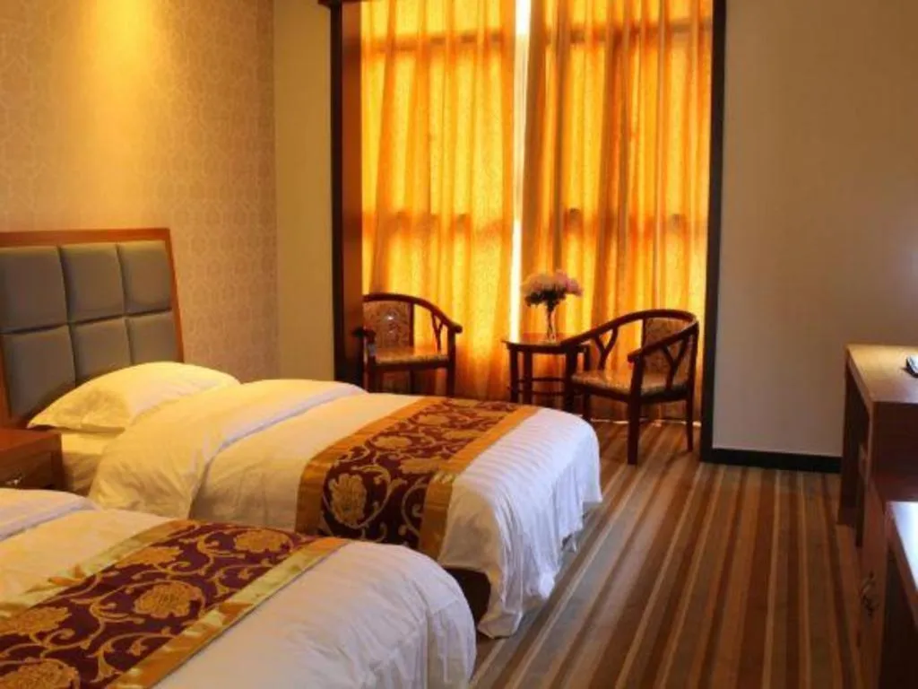 Bed in 169 Business Hotel