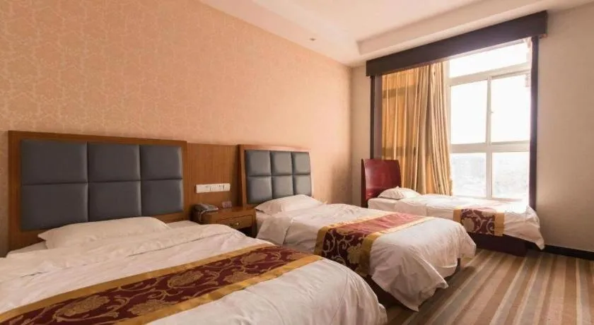 Bed in 169 Business Hotel