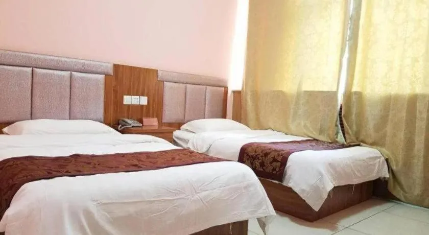 Bed in 169 Business Hotel