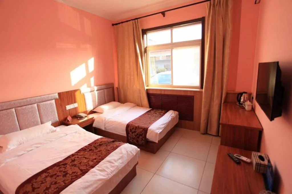 Bed in 169 Business Hotel