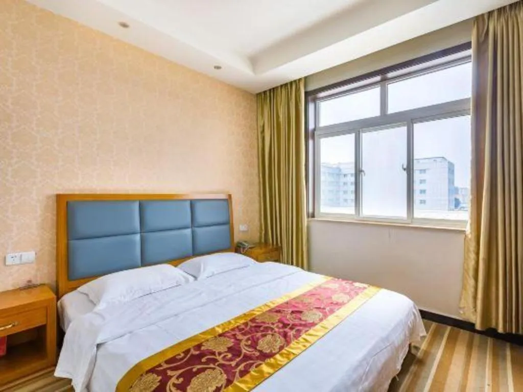 Bed in 169 Business Hotel