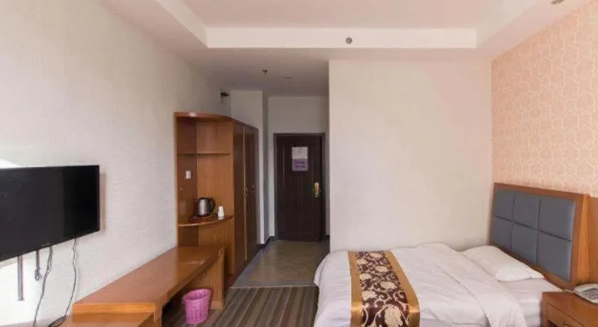 Bed in 169 Business Hotel