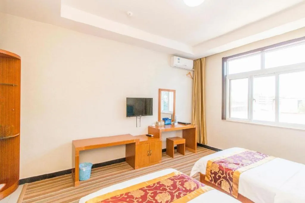 Bed in 169 Business Hotel