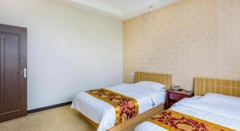 Bed in 169 Business Hotel