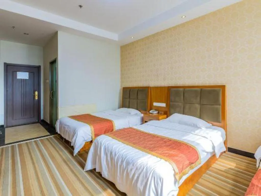 Bed in 169 Business Hotel