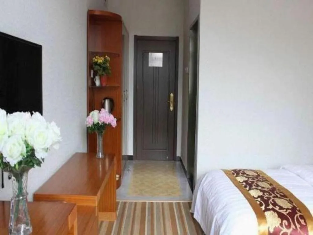 Bed in 169 Business Hotel