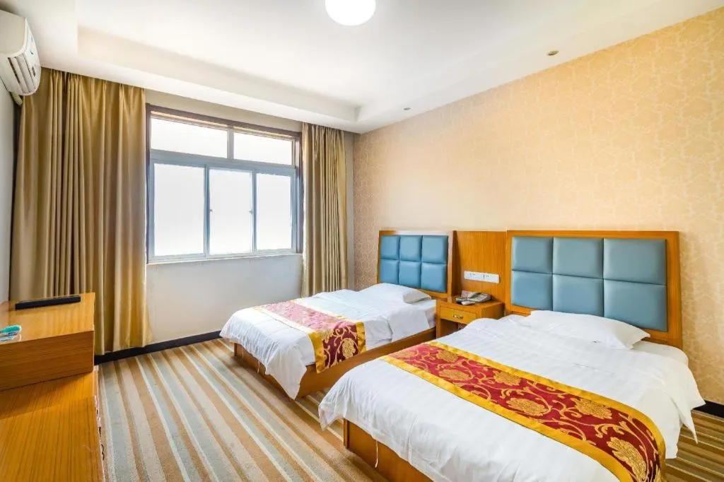 Bed in 169 Business Hotel