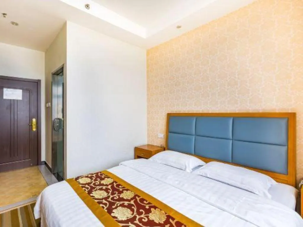 Bed in 169 Business Hotel