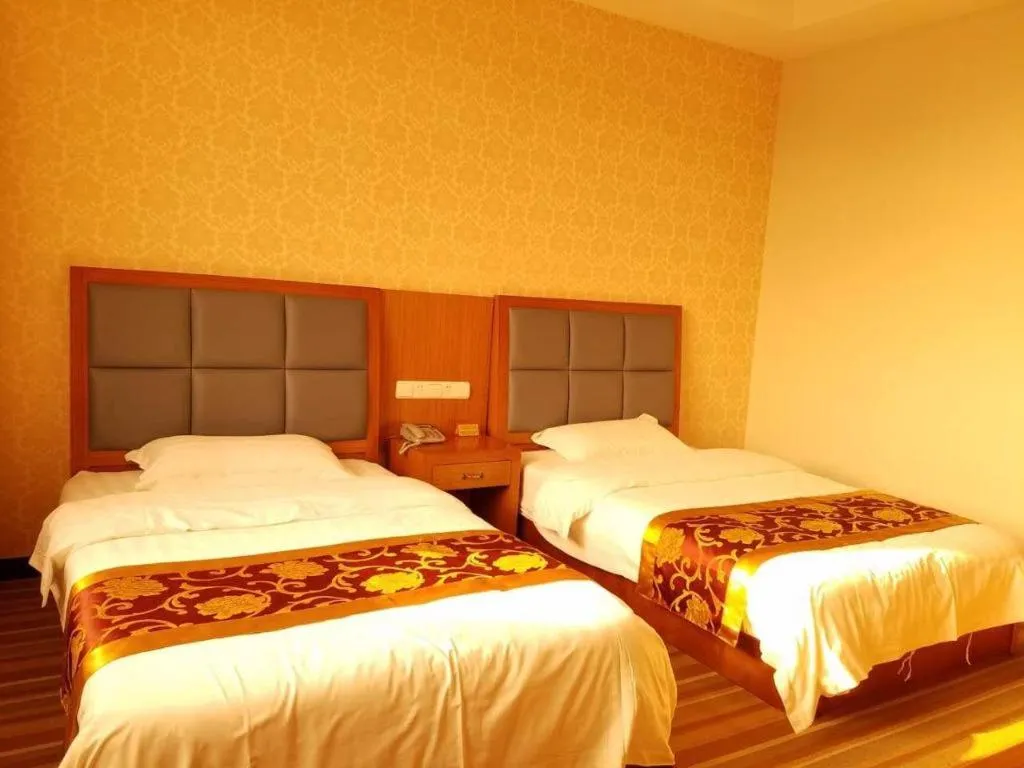 Bed in 169 Business Hotel