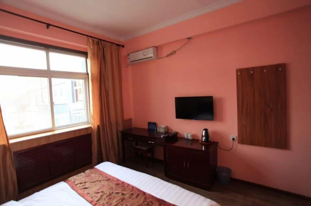 Bed in 169 Business Hotel