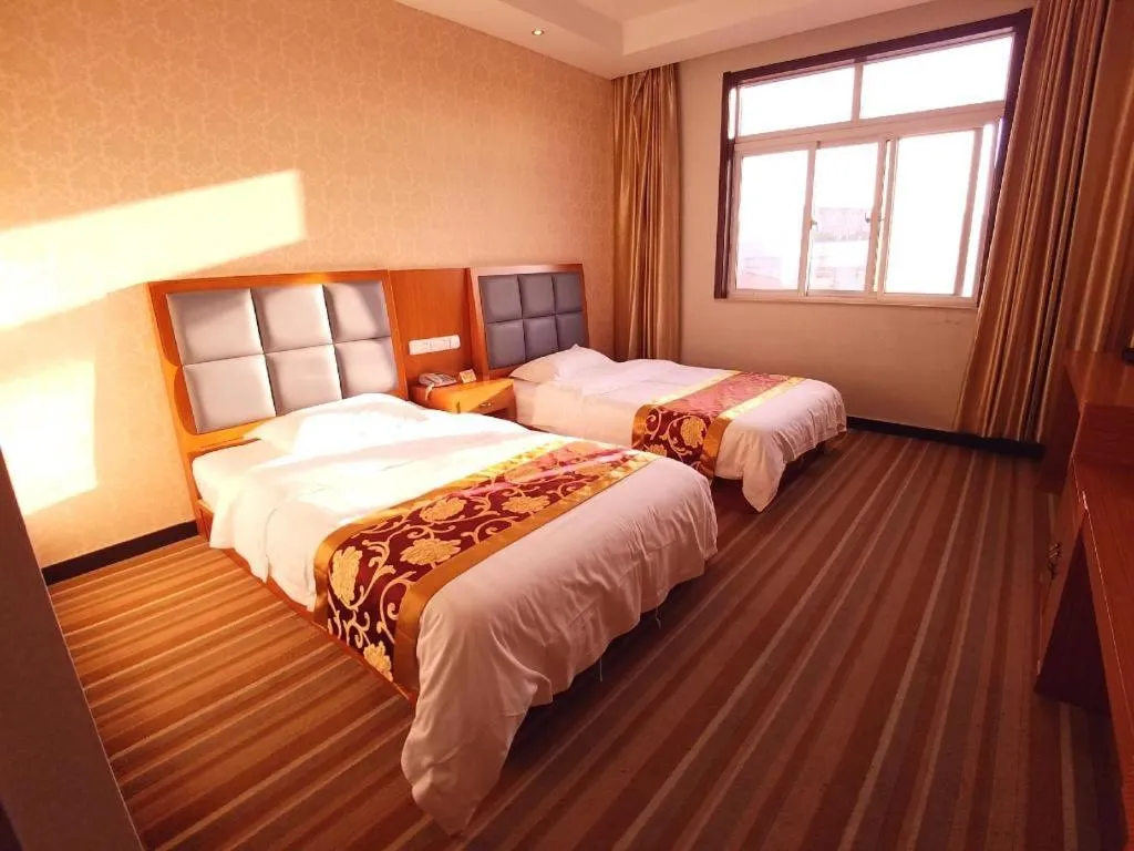 Bed in 169 Business Hotel