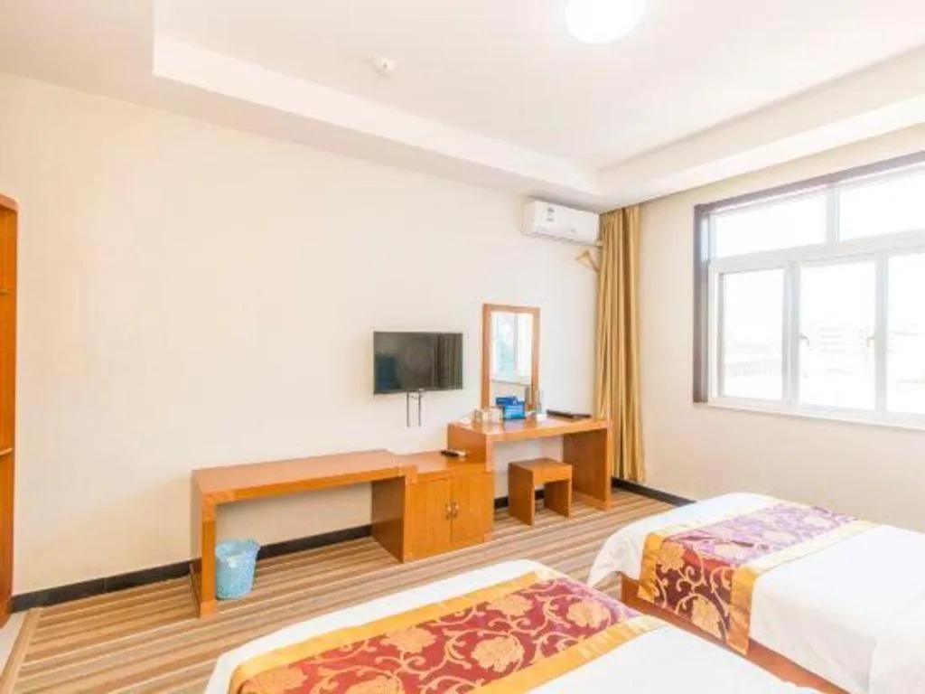 Bed in 169 Business Hotel