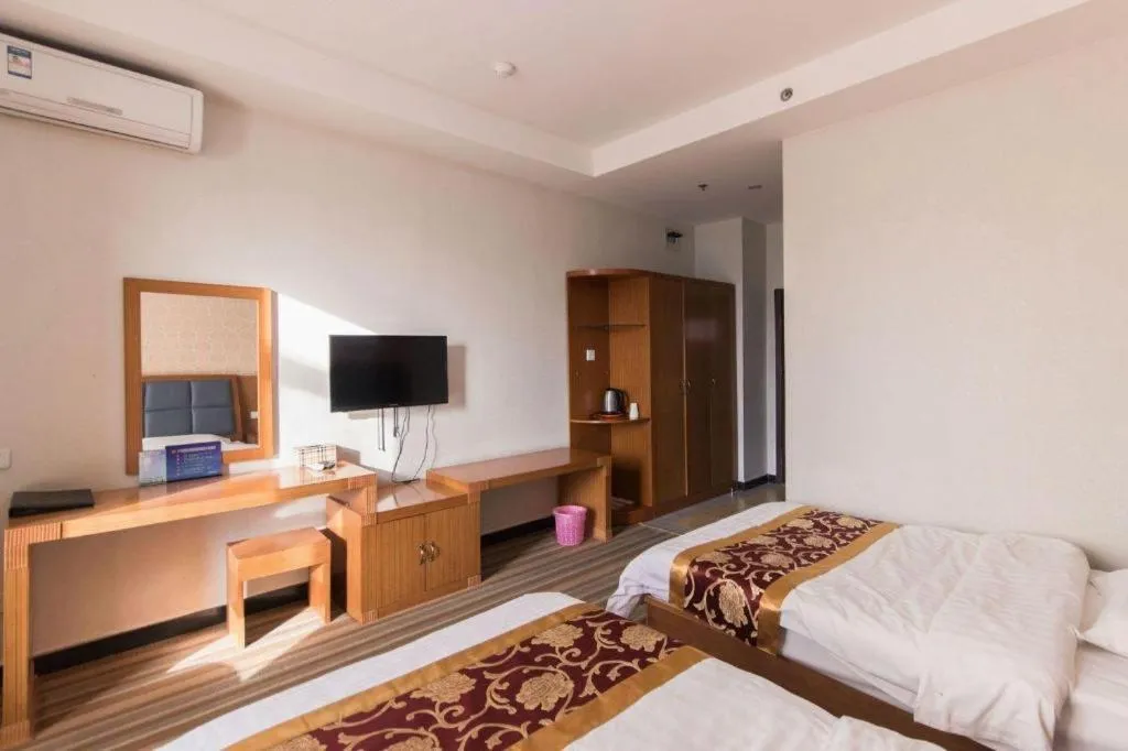 Bed in 169 Business Hotel