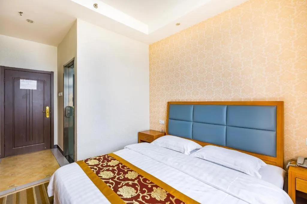 Bed in 169 Business Hotel