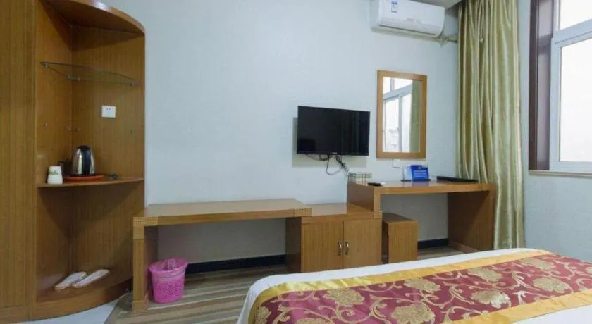 Bed in 169 Business Hotel