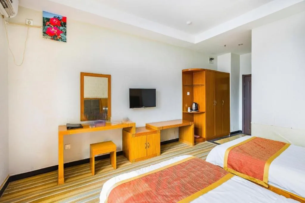 Bed in 169 Business Hotel