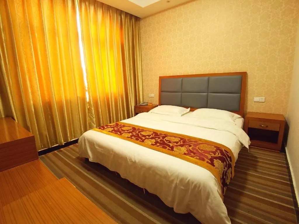 Bed in 169 Business Hotel