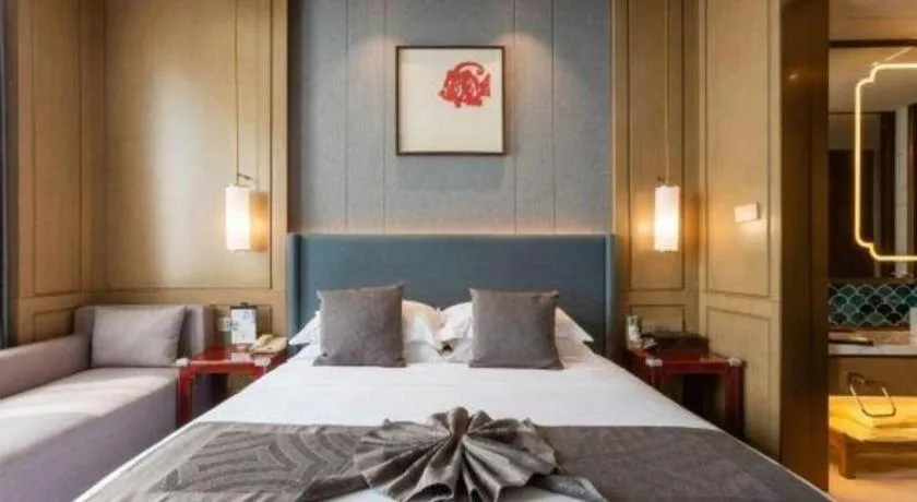 Bed in Bliss International Hotel Weihai