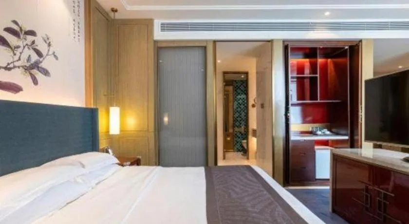 Bed in Bliss International Hotel Weihai