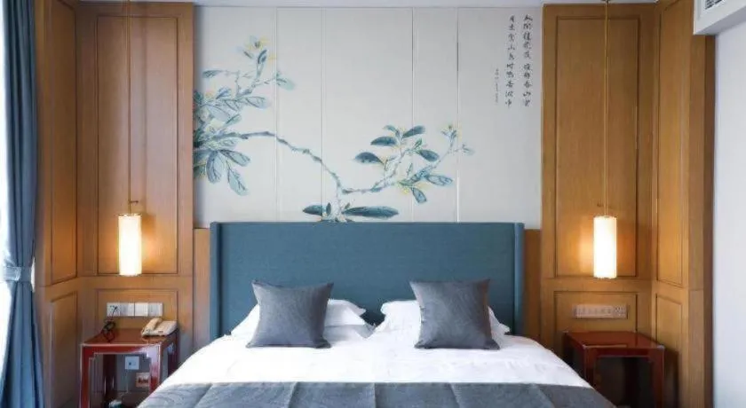 Bed in Bliss International Hotel Weihai