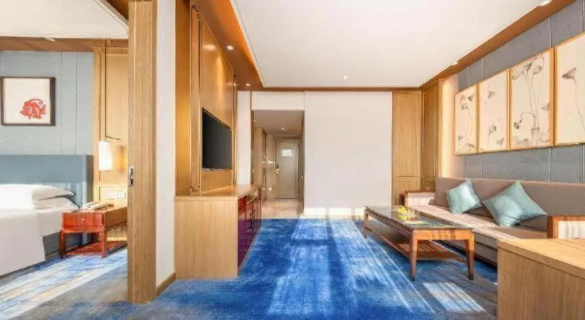 Bed in Bliss International Hotel Weihai