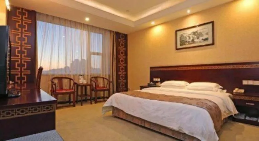 Bed in Bliss International Hotel Weihai
