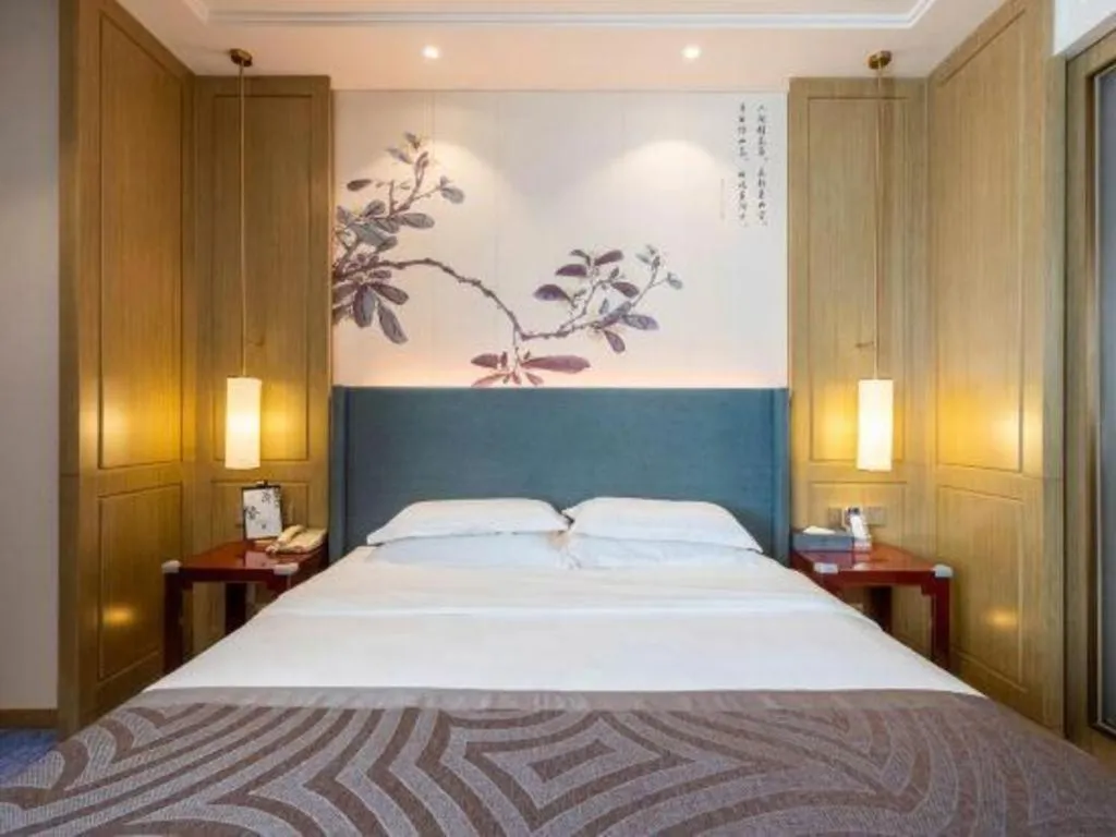 Bed in Bliss International Hotel Weihai