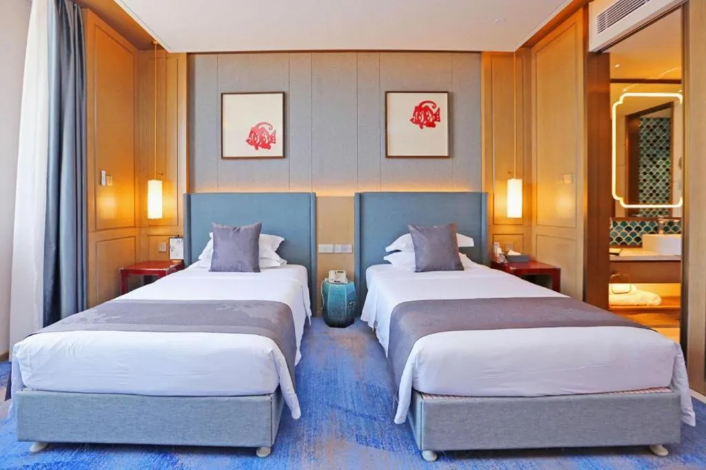 Bed in Bliss International Hotel Weihai