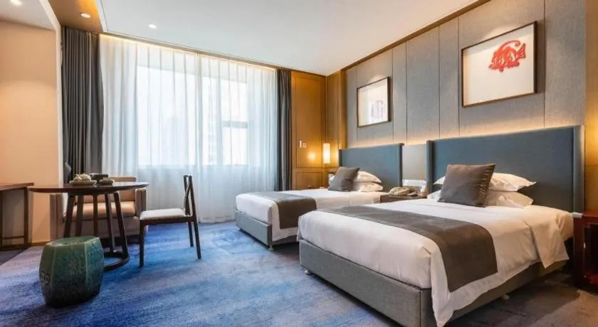 Bed in Bliss International Hotel Weihai