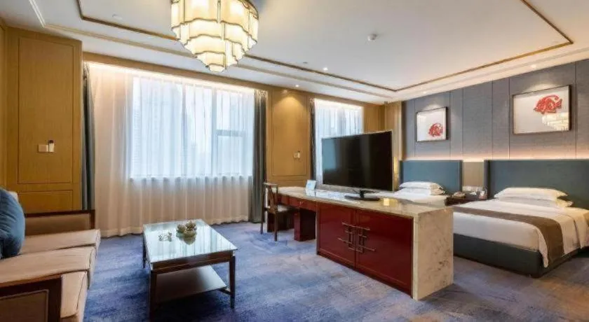 Bed in Bliss International Hotel Weihai