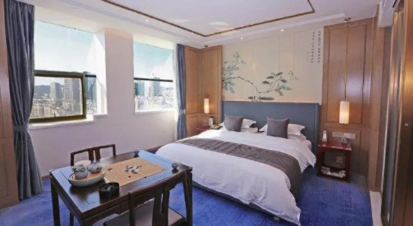 Bed in Bliss International Hotel Weihai