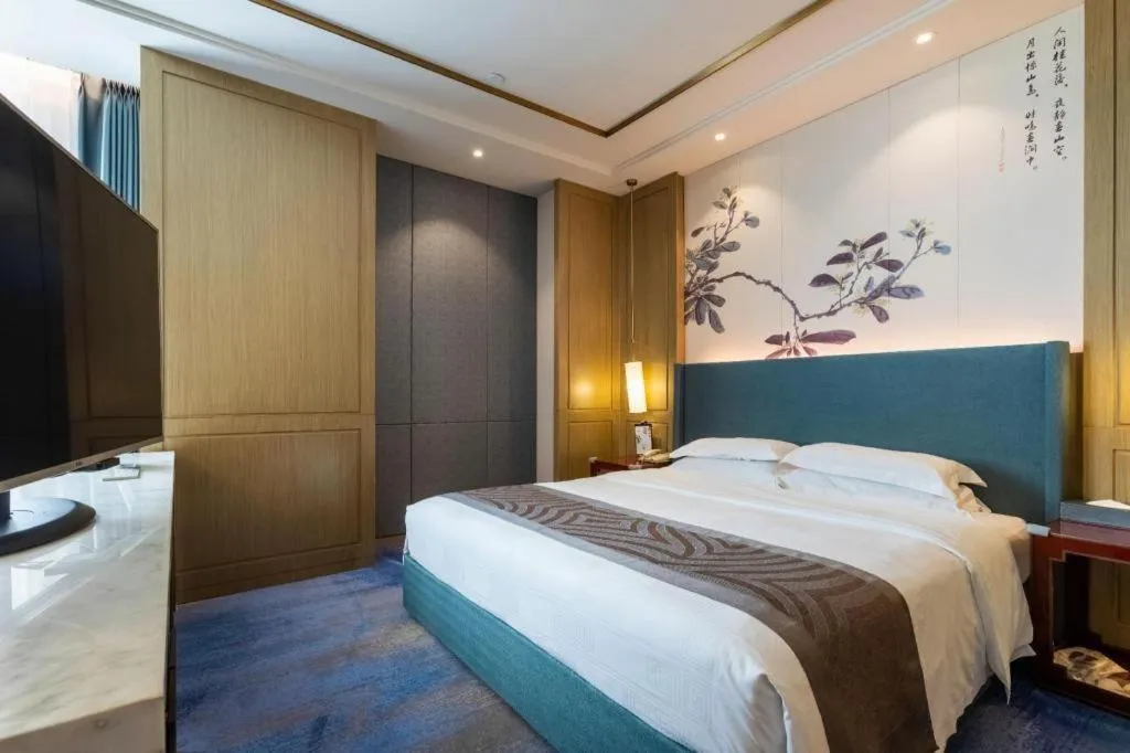 Bed in Bliss International Hotel Weihai