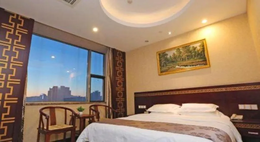 Bed in Bliss International Hotel Weihai