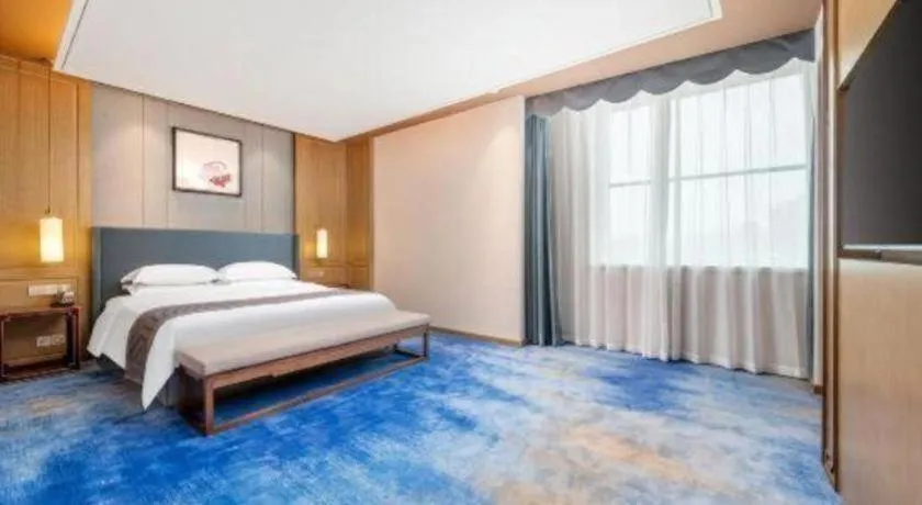 Bed in Bliss International Hotel Weihai