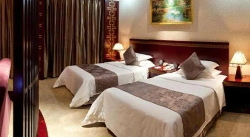 Bed in Bliss International Hotel Weihai