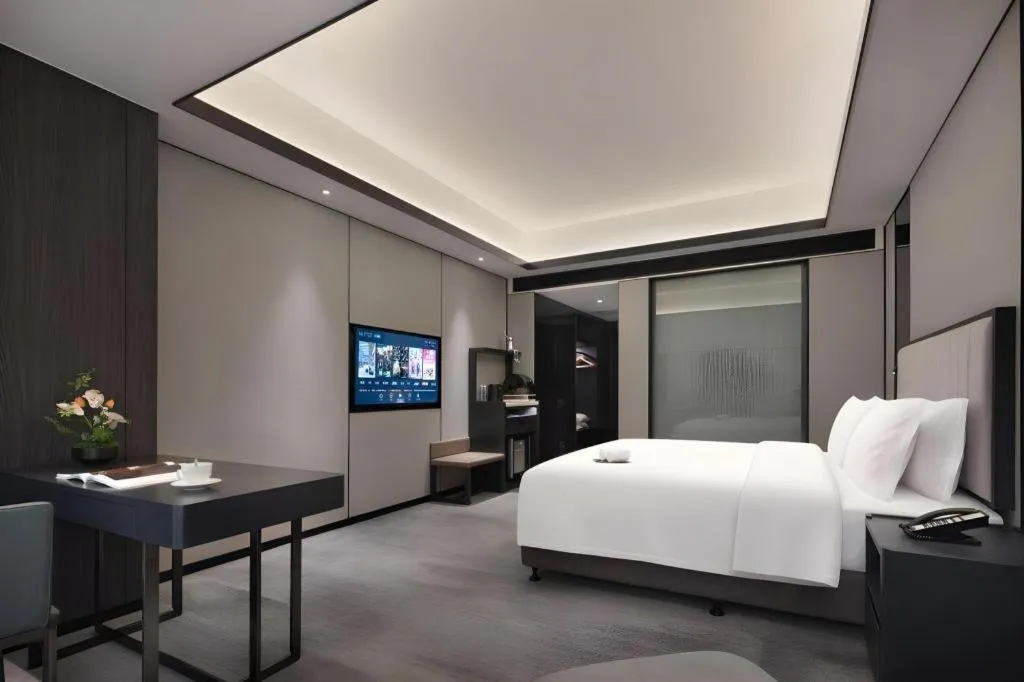 Bed in Changsha Jasmine International Hotel