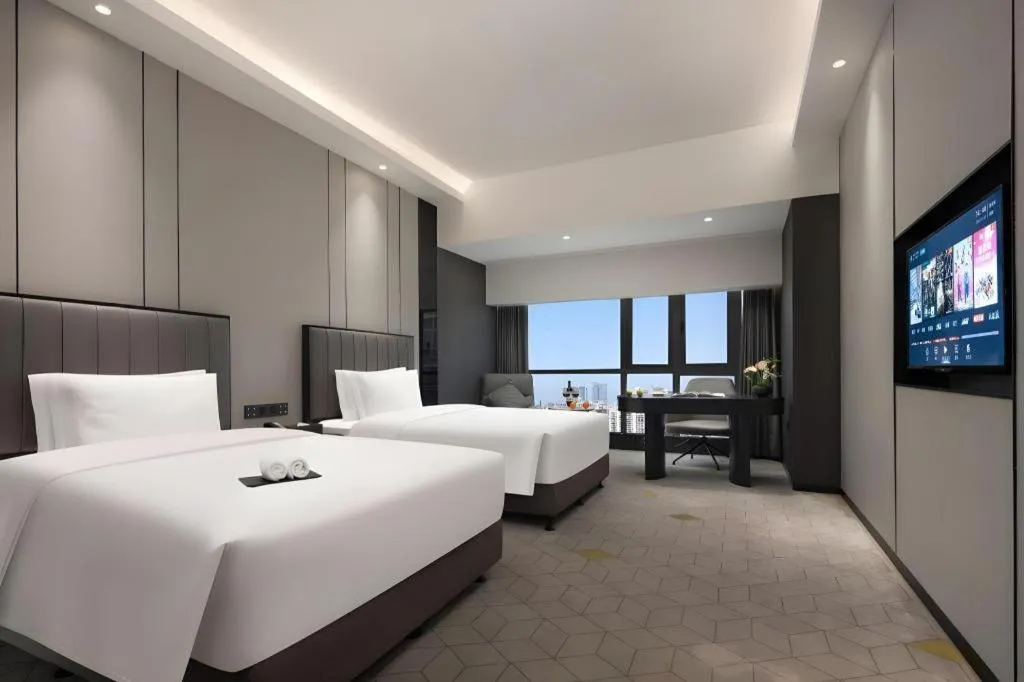 Bed in Changsha Jasmine International Hotel