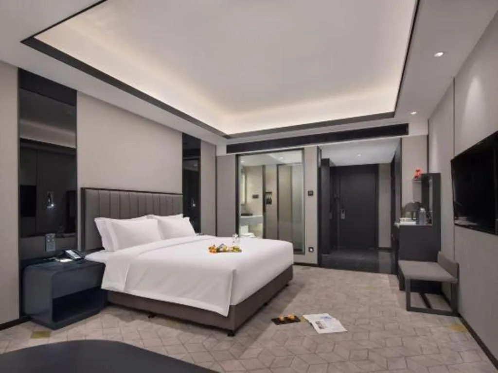 Bed in Changsha Jasmine International Hotel