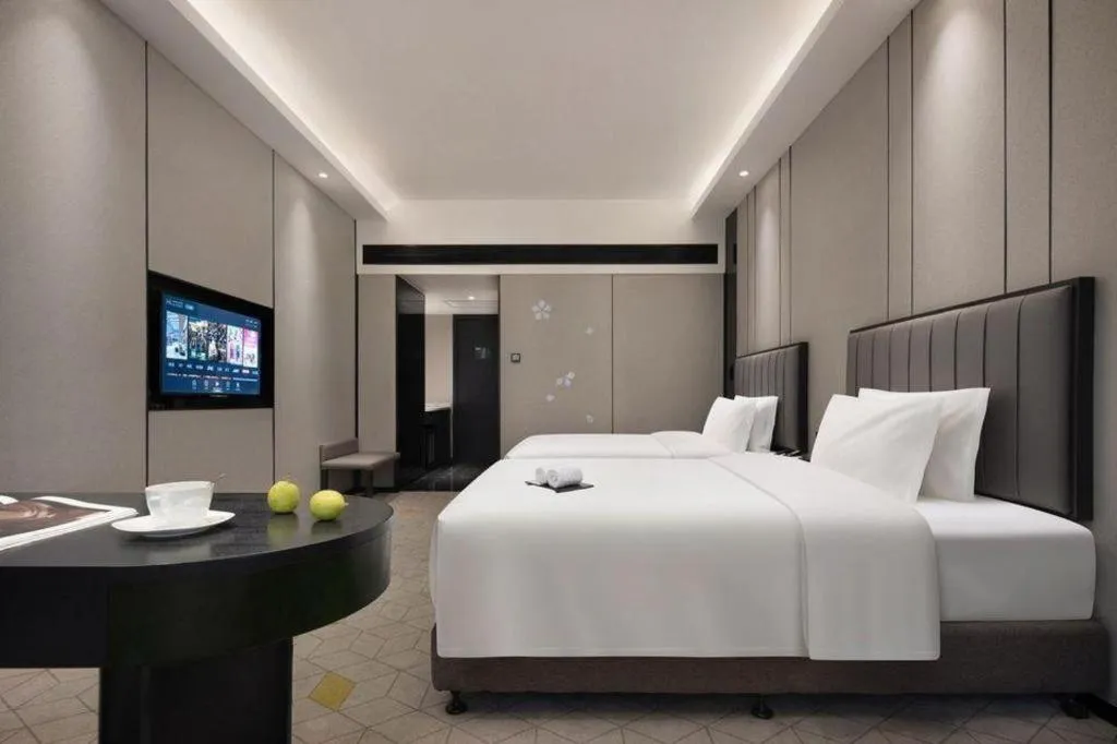 Bed in Changsha Jasmine International Hotel