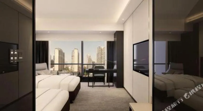 Bed in Changsha Jasmine International Hotel