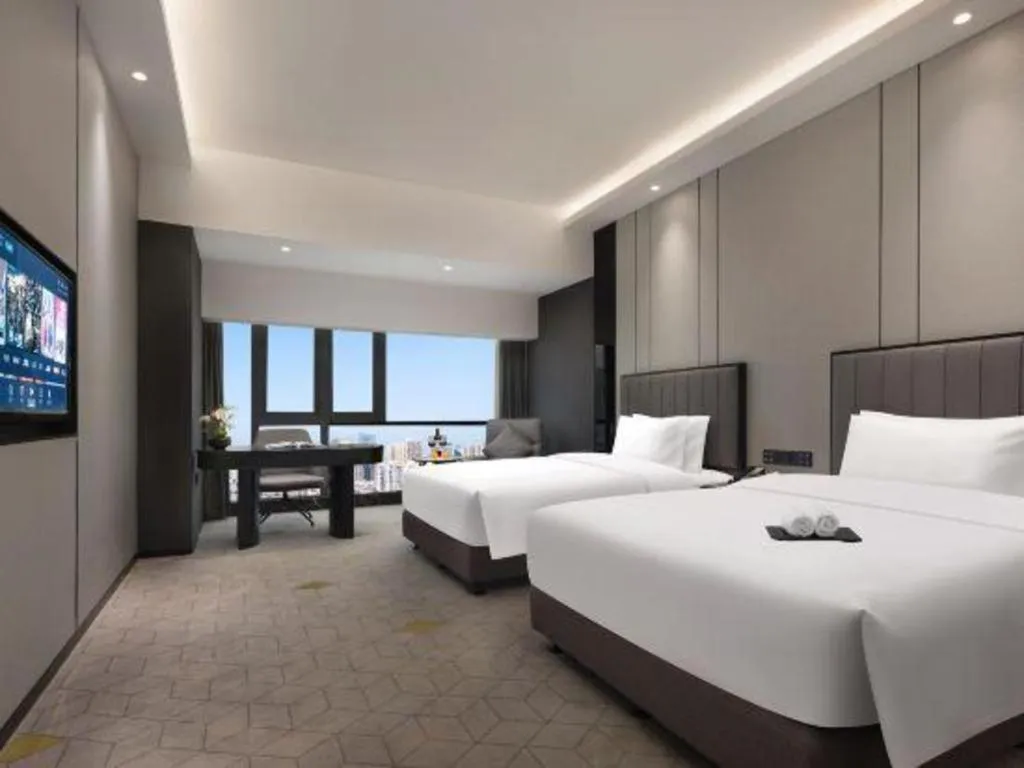 Bed in Changsha Jasmine International Hotel