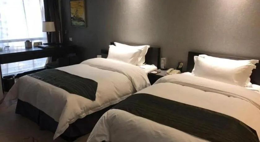 Bed in Changsha Jasmine International Hotel