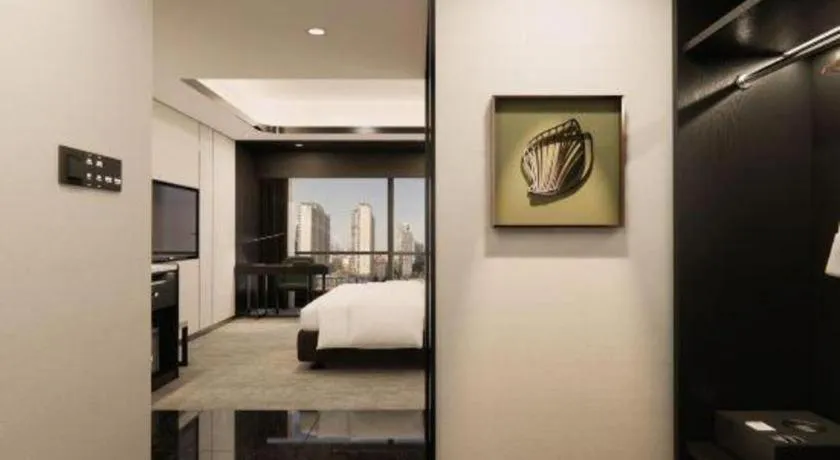 Bed in Changsha Jasmine International Hotel