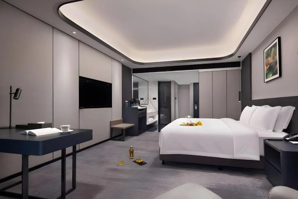 Bed in Changsha Jasmine International Hotel