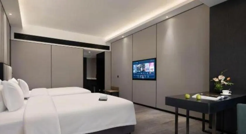 Bed in Changsha Jasmine International Hotel